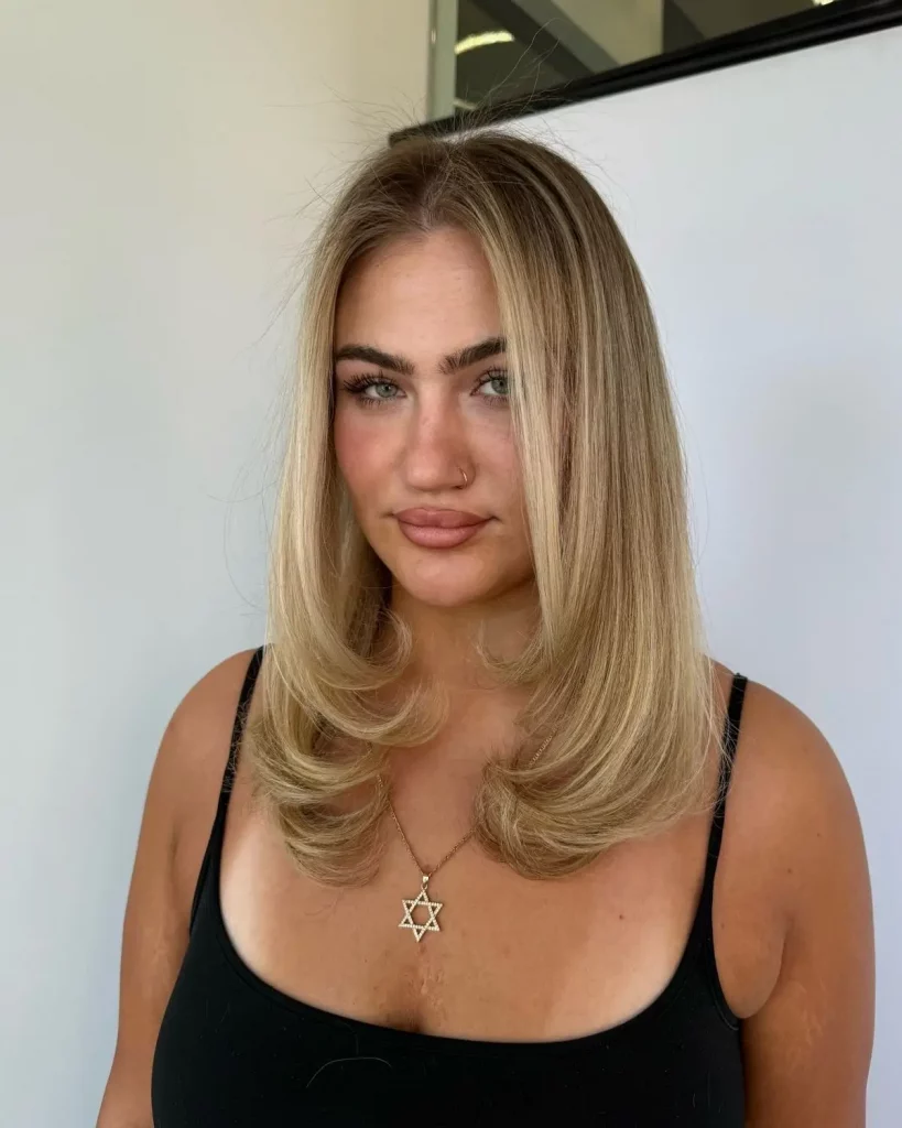 Halblange Frisuren 2025: Die 16 schönsten Ideen für mittellanges Haar