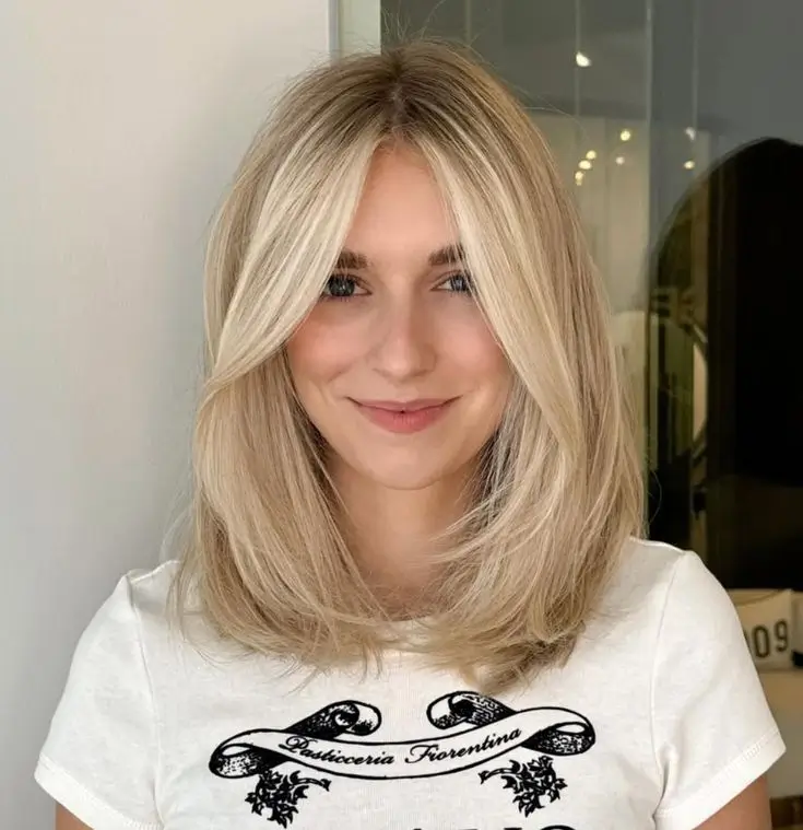 Halblange Frisuren 2025: Die 16 schönsten Ideen für mittellanges Haar