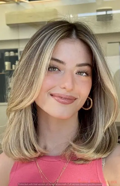 Halblange Frisuren 2025: Die 16 schönsten Ideen für mittellanges Haar